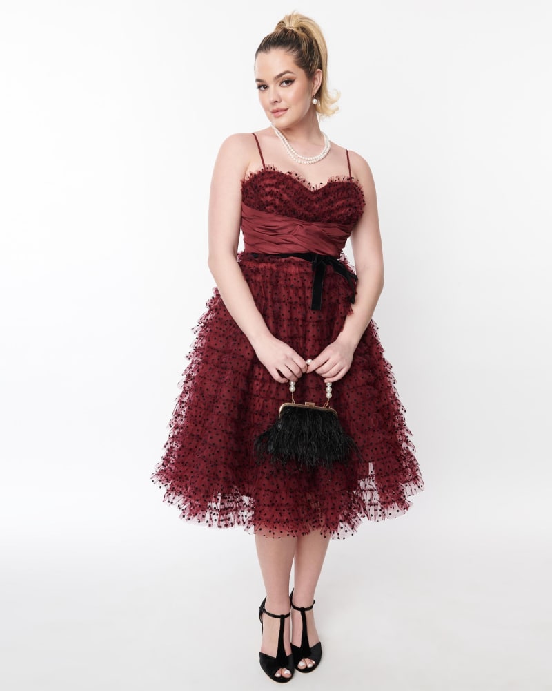 Front of a model wearing a size 1X Unique Vintage Burgundy & Black Polka Dot Tulle Cupcake Swing Dress in Burgundy by Unique Vintage. | dia_product_style_image_id:315068